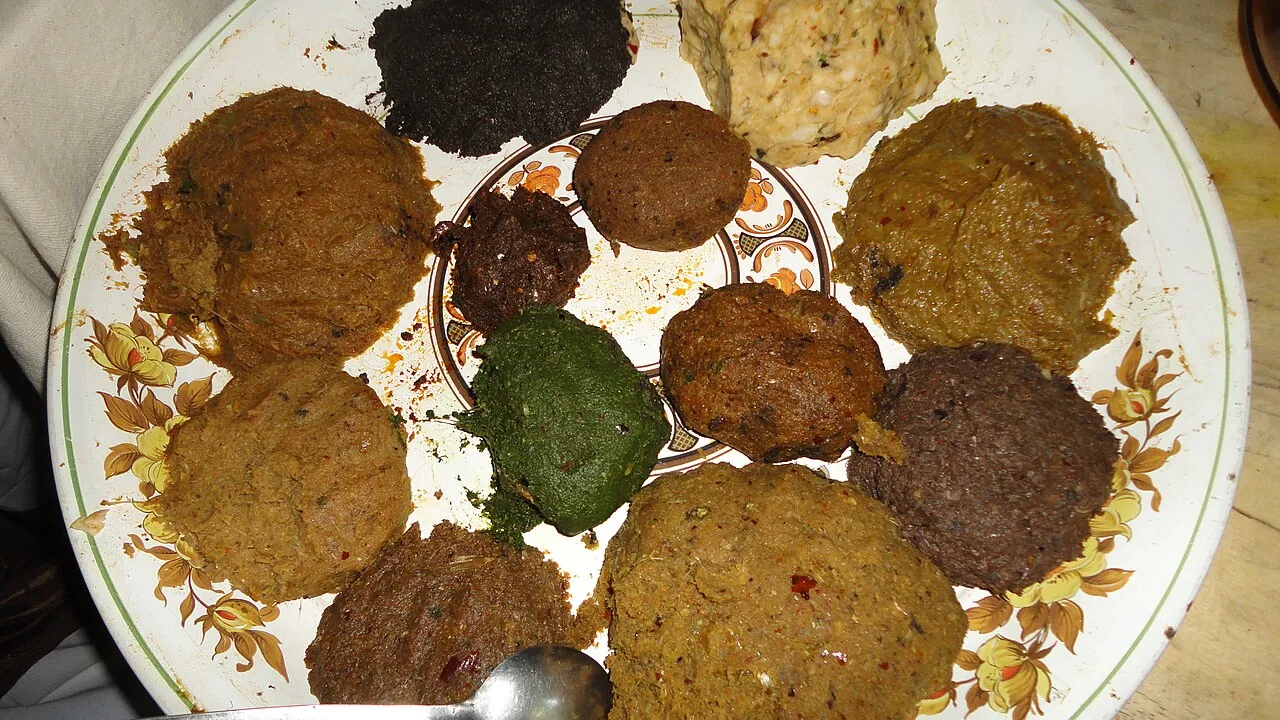 A traditional Bangladeshi spread of assorted vortas on a plate
